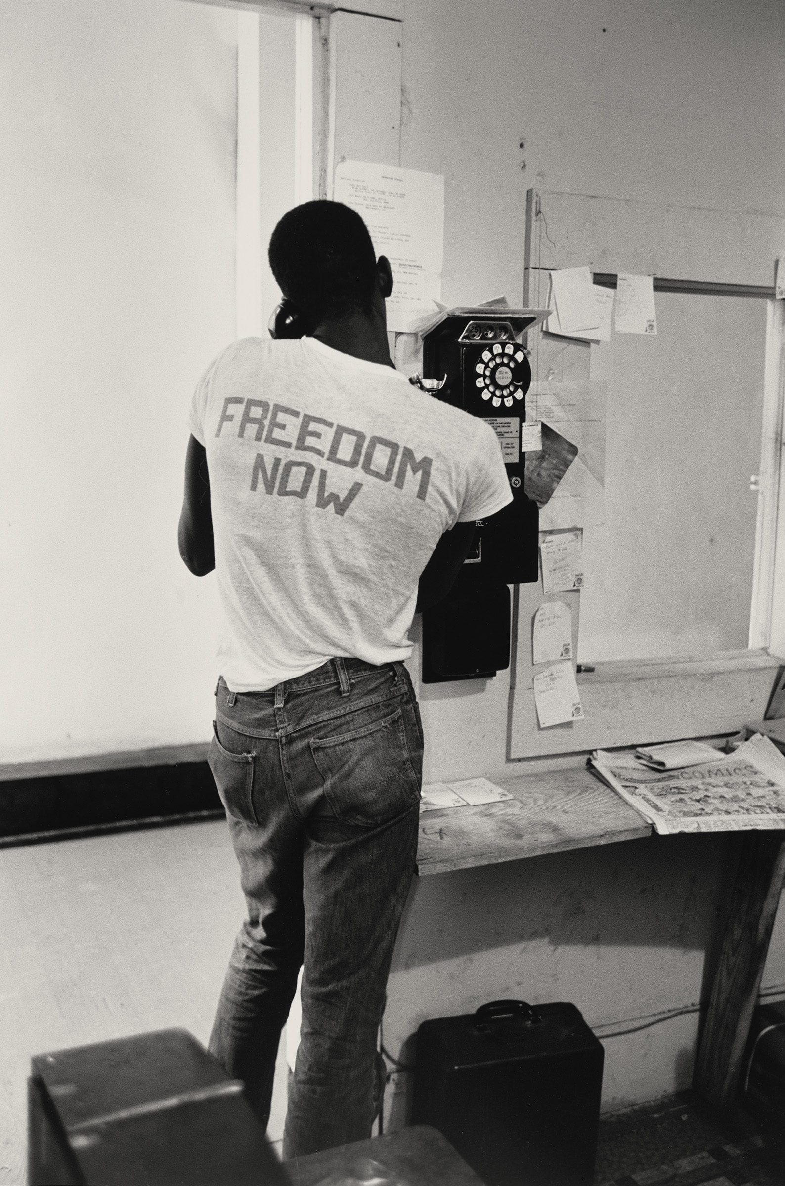 Freedom Now, 1964. Photograph by Steve Schapiro. A Black man is wearing a t-shirt that says 